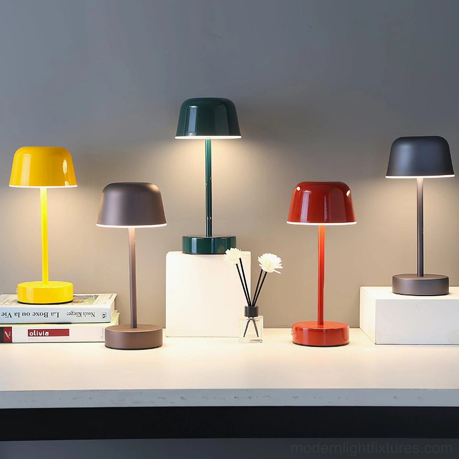 Nico LED table lamp color options red yellow green overhead flat lay display with decorative accents