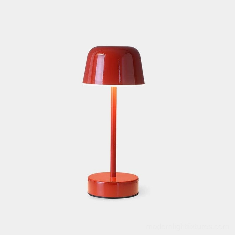 Nico cordless LED table lamp with glossy red metal finish, minimalist mushroom design on white background