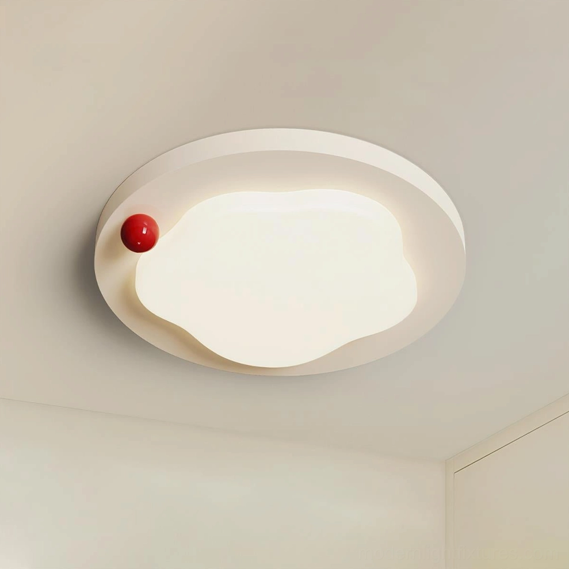 Close-up of Niera organic ceiling light showing frosted acrylic diffuser and red decorative accent ball detail