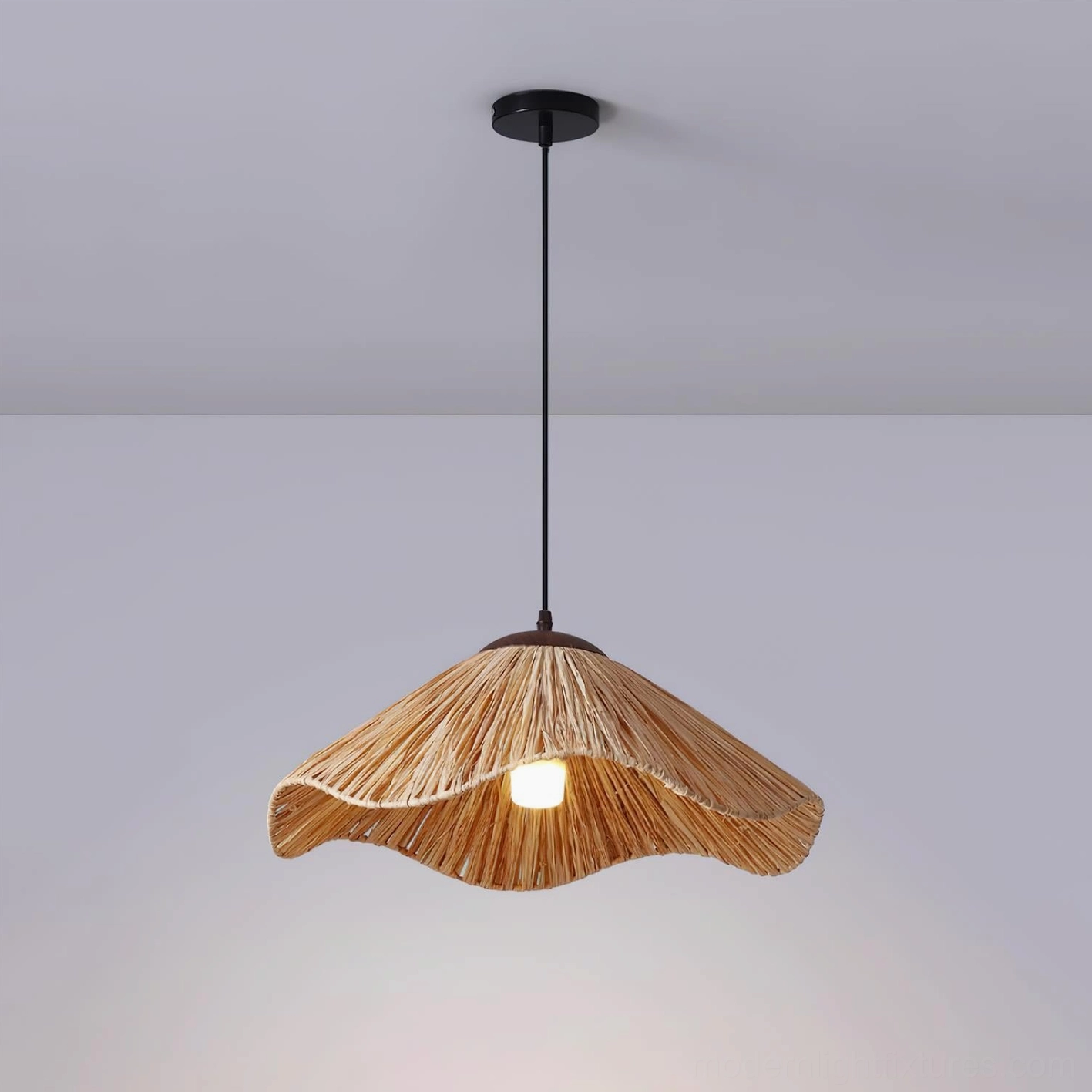 Natural rattan wavy pendant lamp three-quarter side view showing organic flowing design with black ceiling hardware