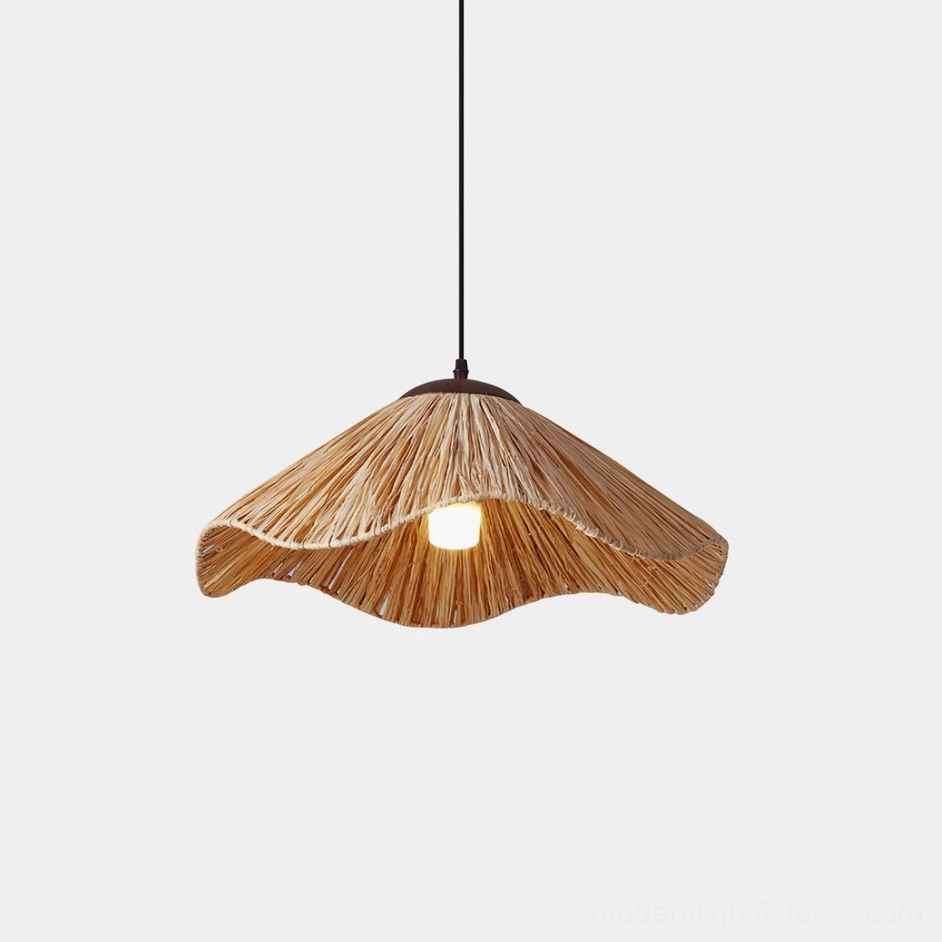 Nikita wavy rattan pendant light with natural woven shade, overhead studio view showing sculptural wave design