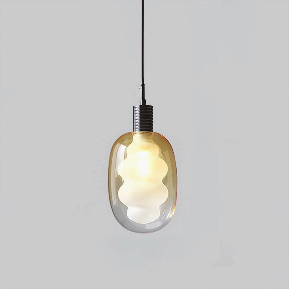 Nimbus Black and Amber pendant light, warm-toned color variant, modern sculptural glass fixture with contemporary design