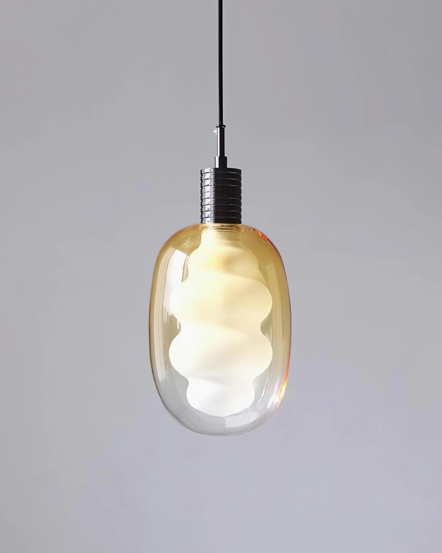 Nimbus modern pendant light close-up detail, handblown glass surface texture and gradient coloring, artisanal craftsmanship showcase