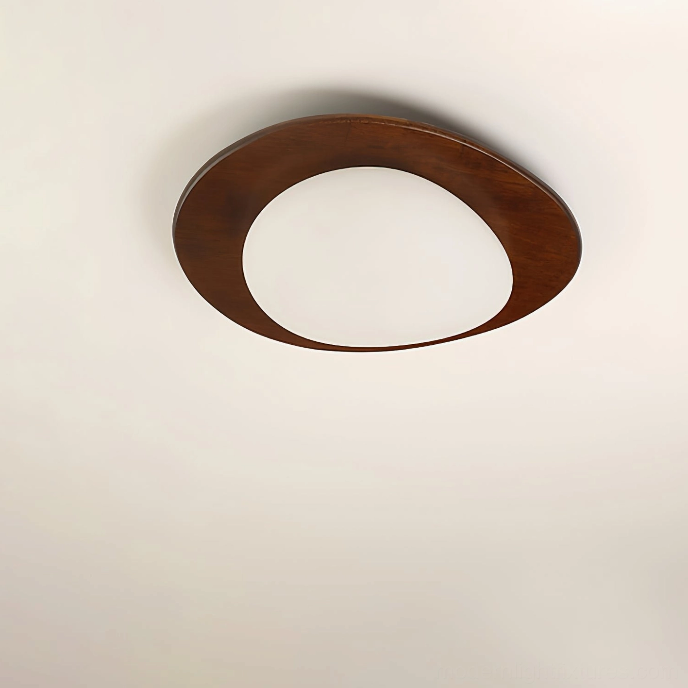 Niseko asymmetrical oval flush mount light fixture, partial dark wood trim design, white acrylic light panel