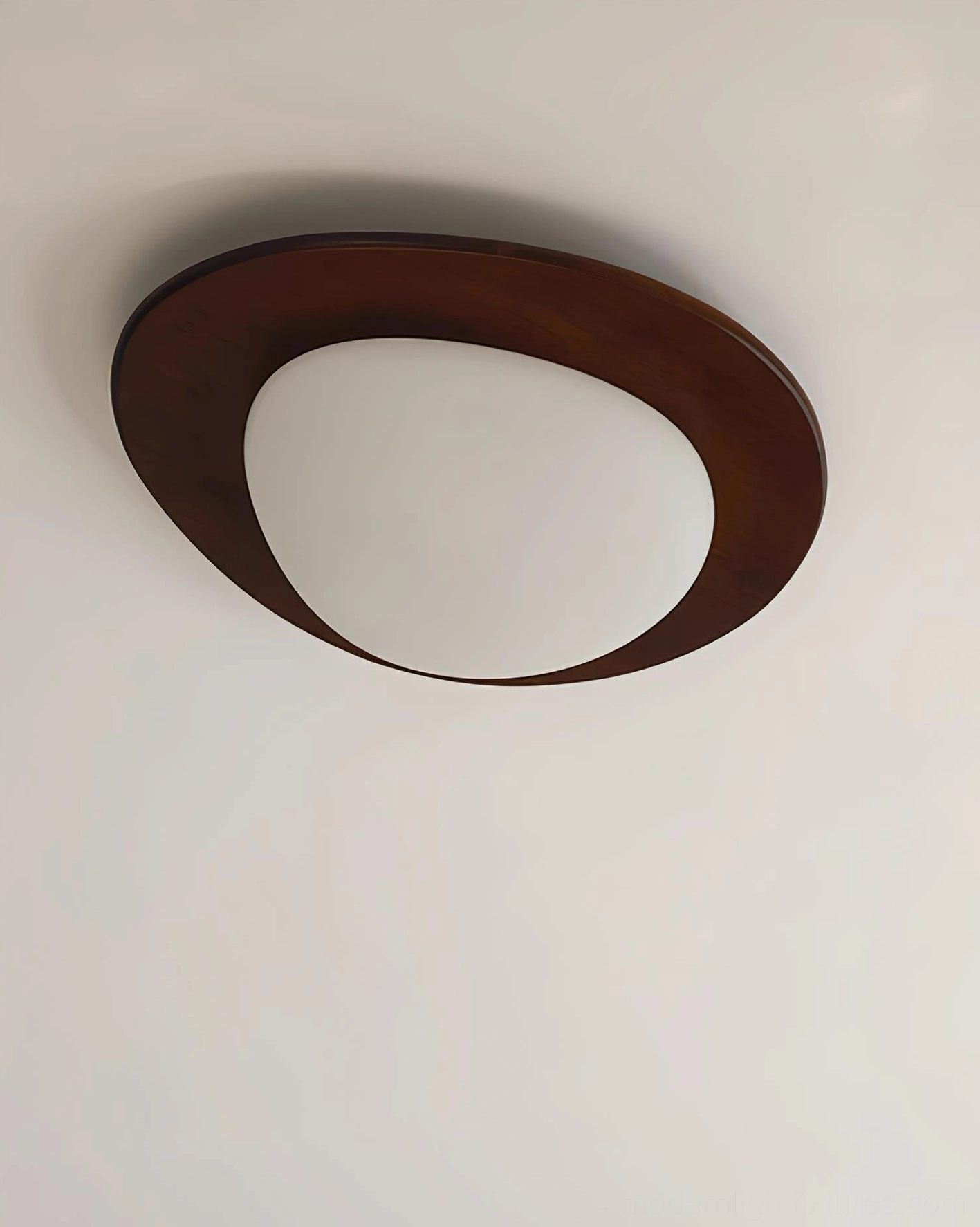 Niseko oval flush mount ceiling light in modern home interior showing soft even illumination distribution
