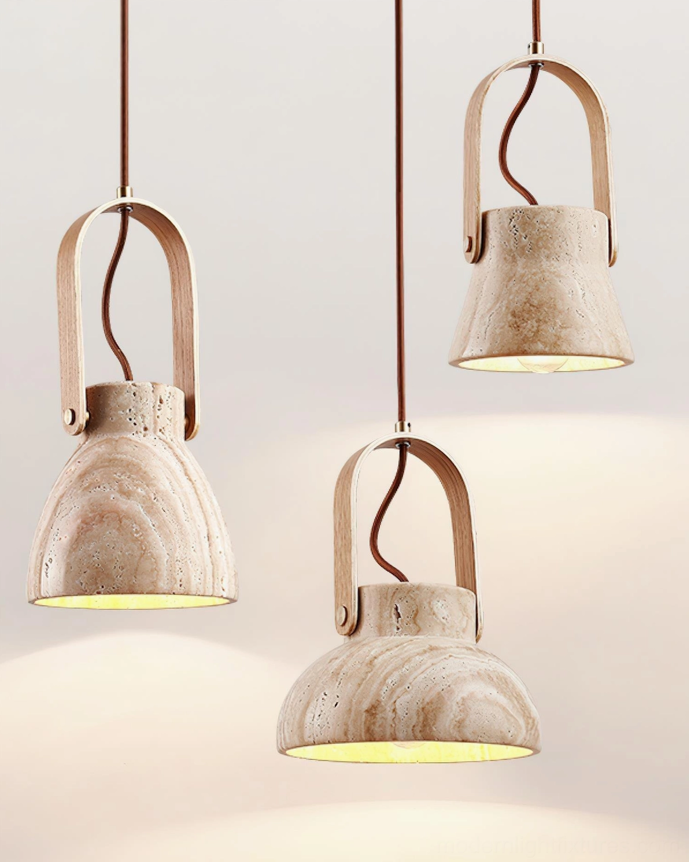 Three matching Nissa travertine pendant lights with wood arches, coordinated pendant light set