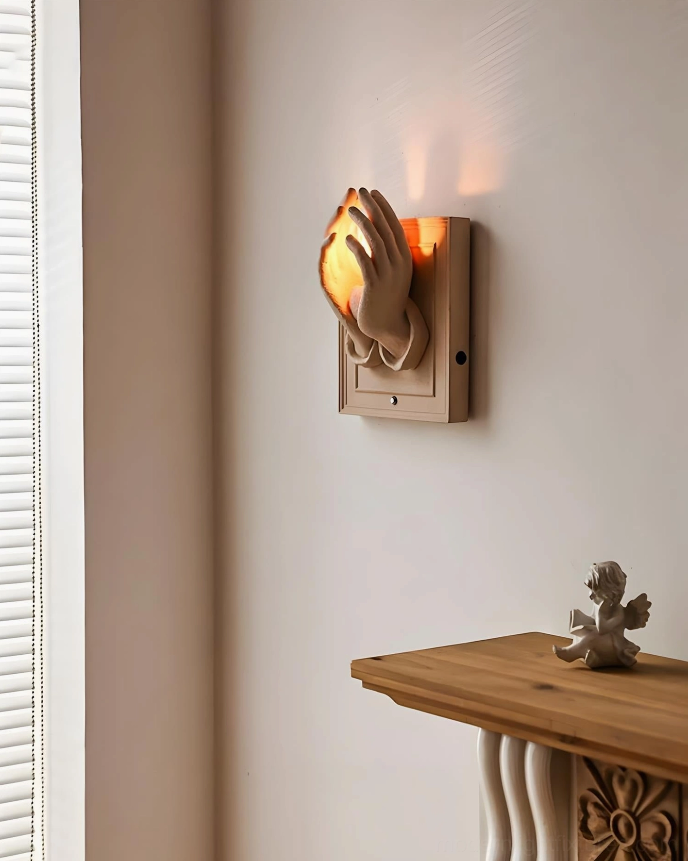 Beige wall sconce with organic curved sculptural design and warm diffused interior illumination
