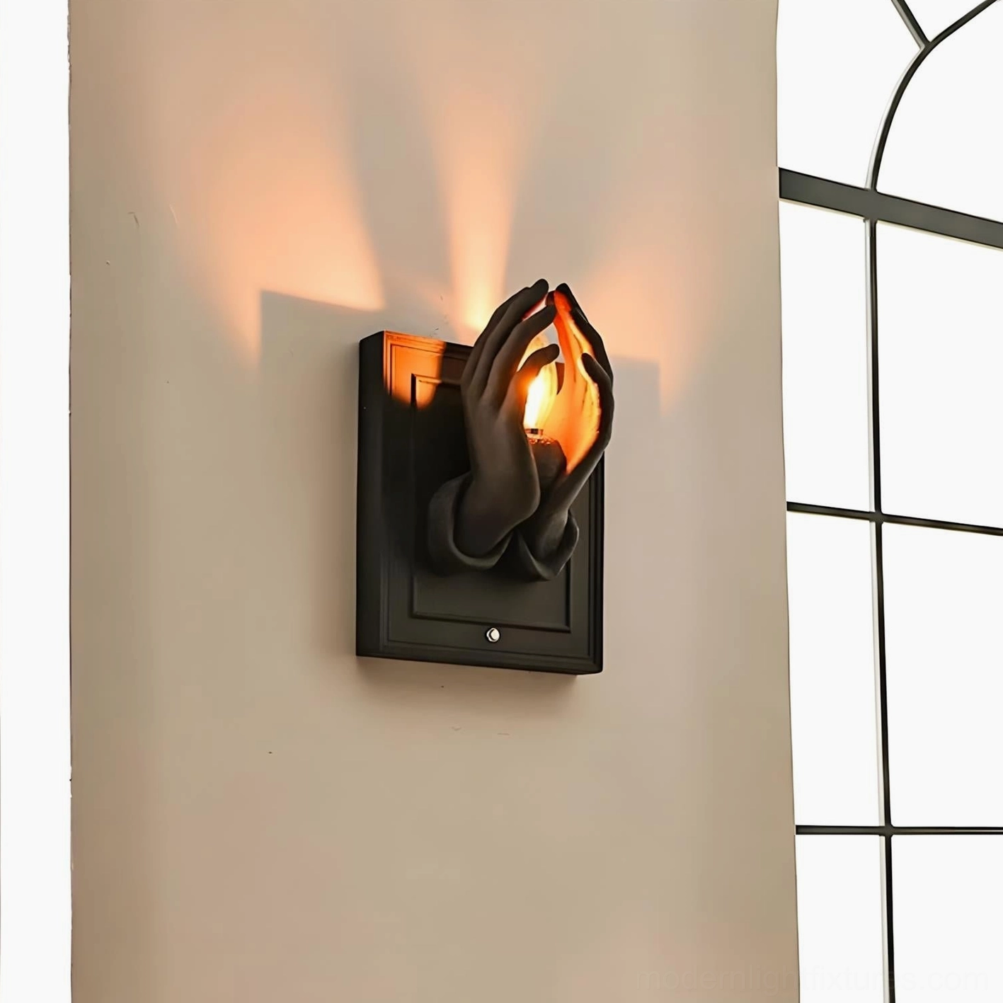 Noctara modern wall sconce with geometric rectangular backplate and expressive artistic hands design
