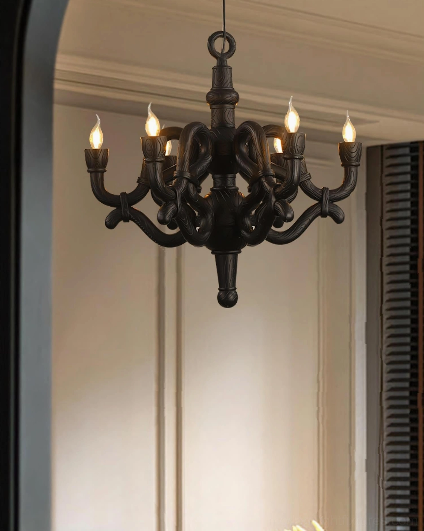 Black matte sculptural chandelier residential hallway paneled walls vintage modern design