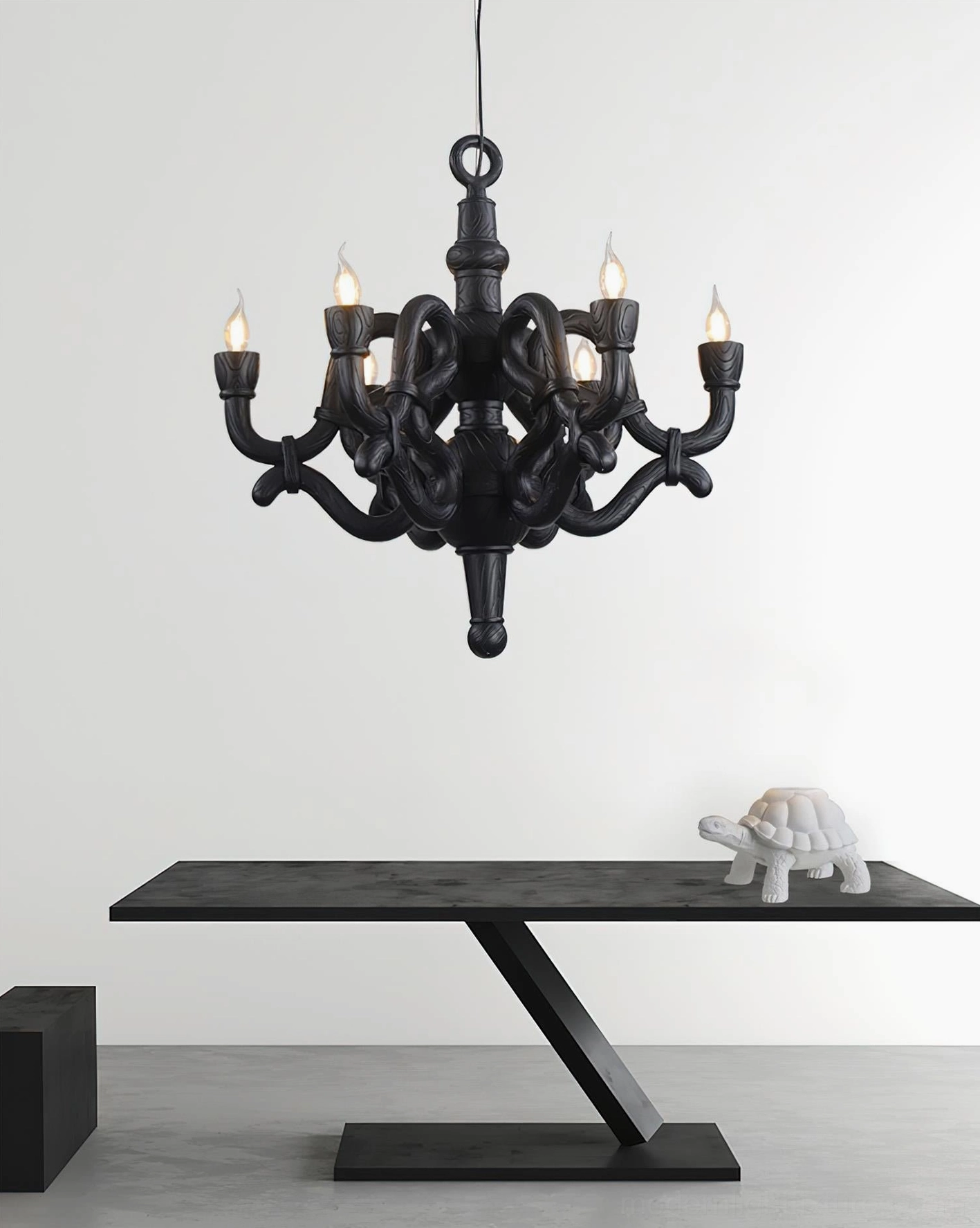 Nocturne black sculptural knotted chandelier studio product display minimalist backdrop