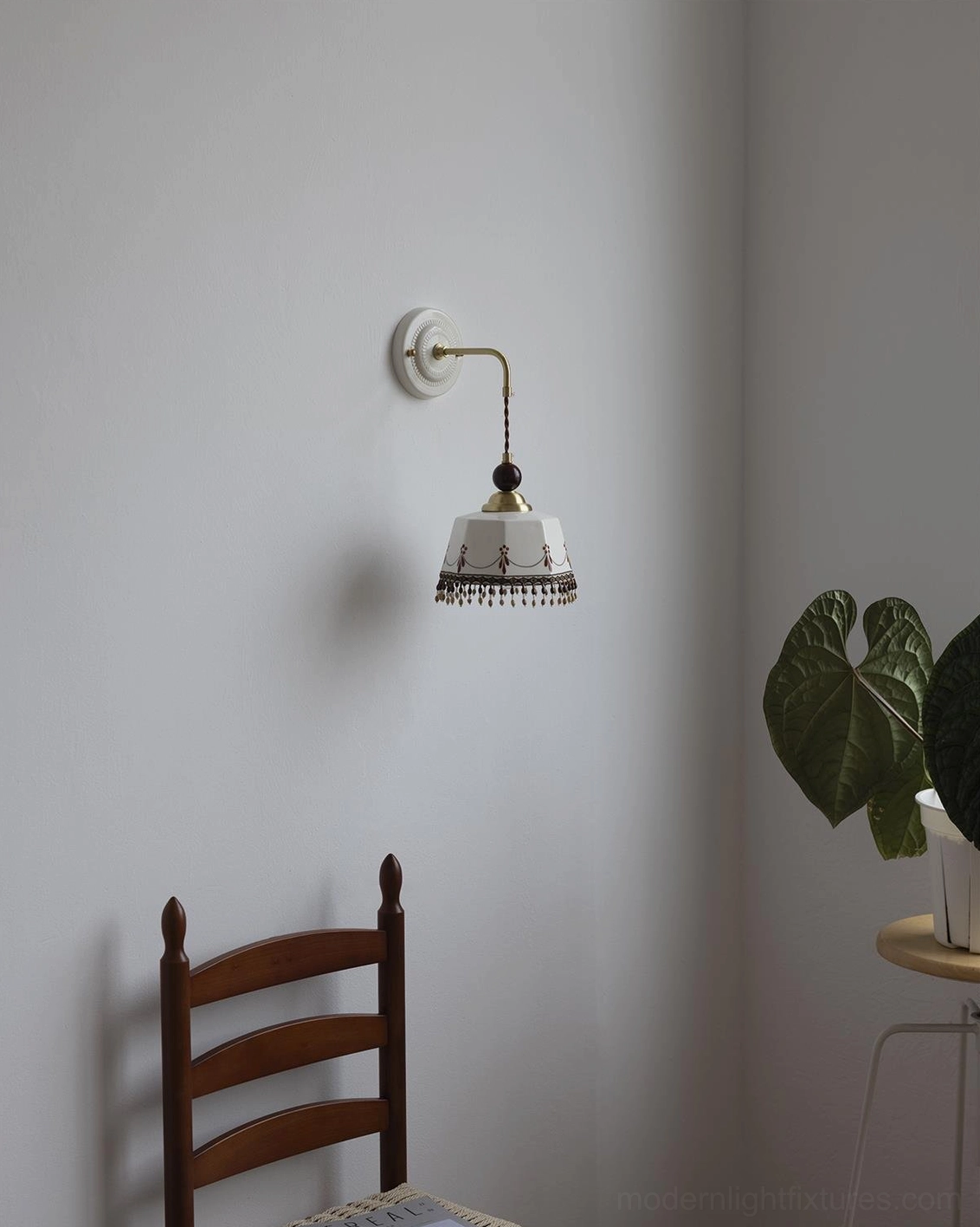 Noemi ceramic wall sconce Mediterranean style interior, warm light, vintage cottage aesthetic, artistic hand-painted shade