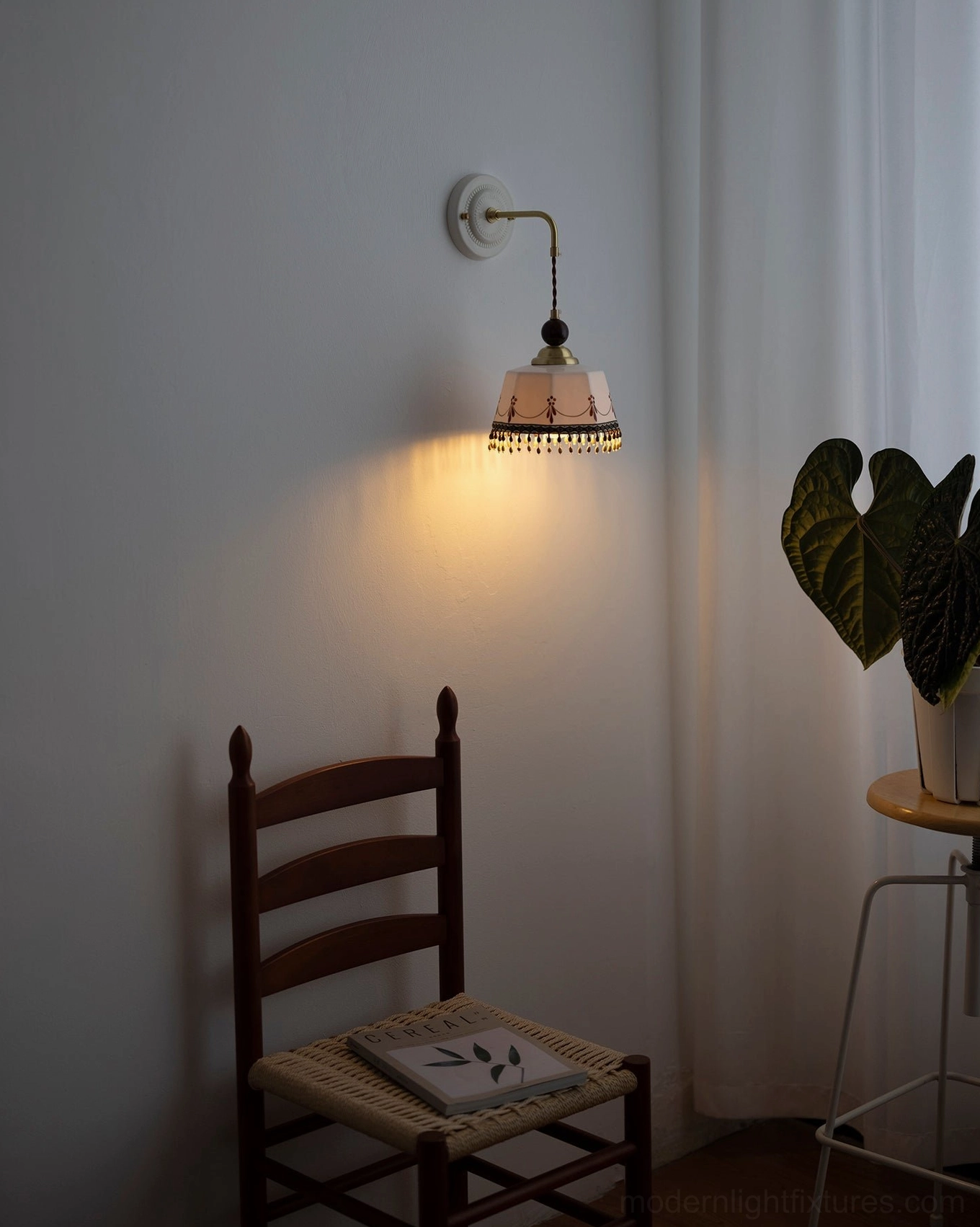 Noemi vintage wall lamp illuminating cozy reading corner, bohemian retro style, warm glowing light, wooden furniture and plants