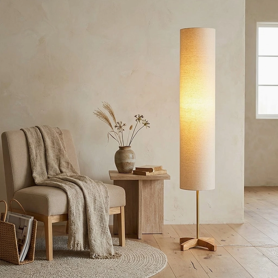 Nomi floor lamp reading nook cozy corner warm light wooden side table home library