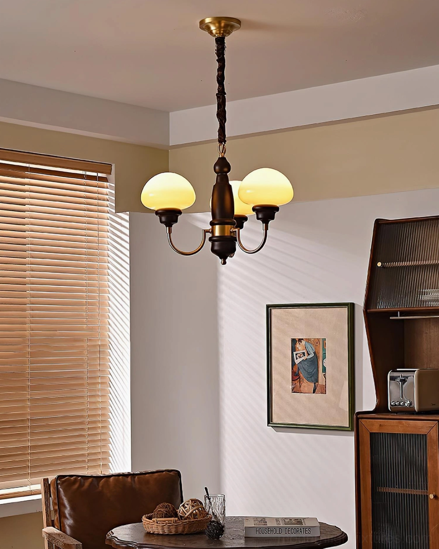 Mushroom chandelier installation showing hanging rod and brass connector details