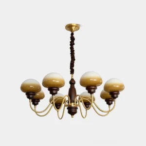 Nonna mushroom chandelier with gradient caramel glass orbs and brass hardware studio front view