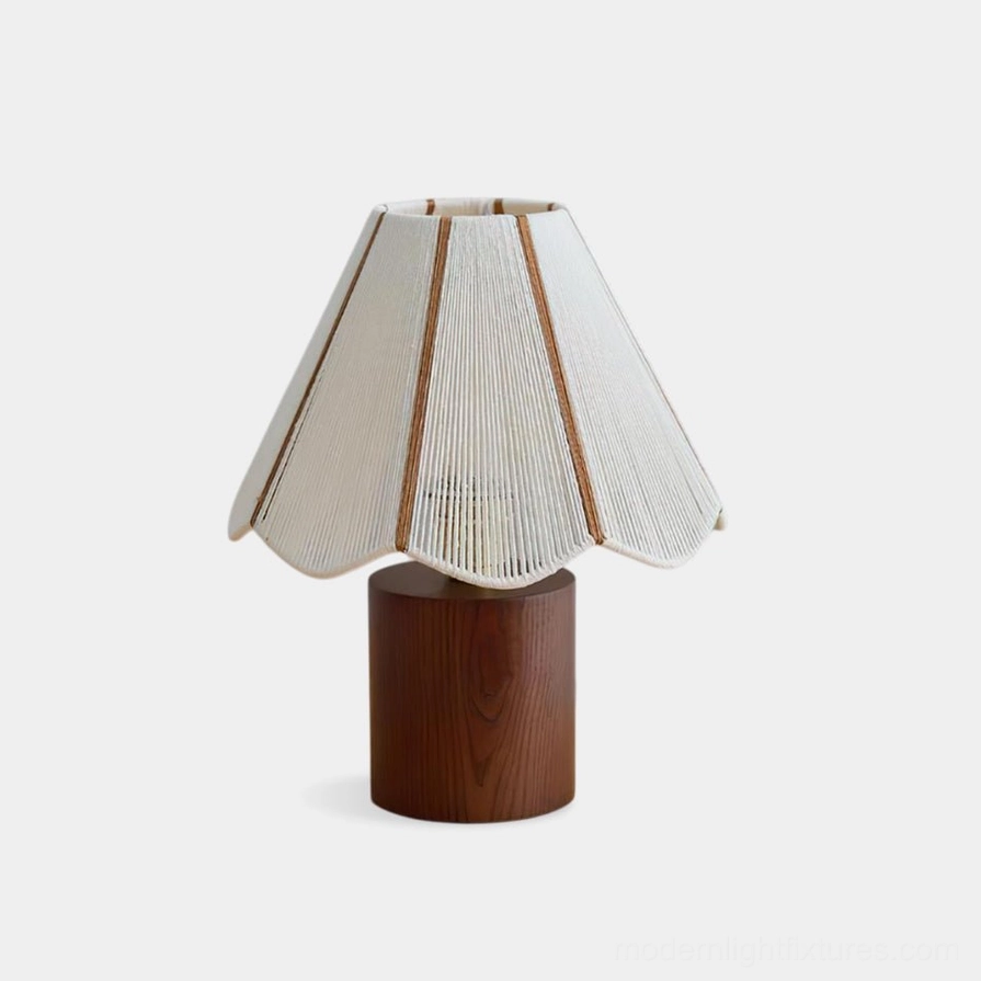Noraya wooden table lamp with pleated fabric shade front view studio