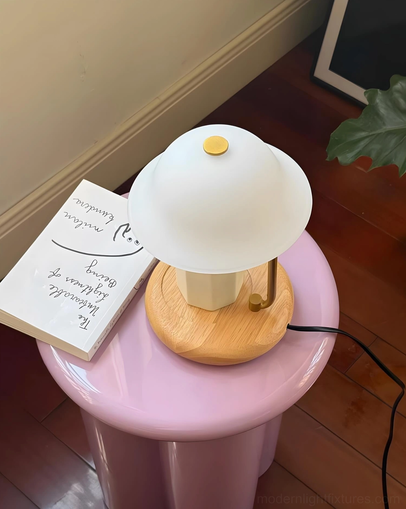 Modern Nordic table lamp with integrated candle warmer, warm metal accents, and sustainable design elements