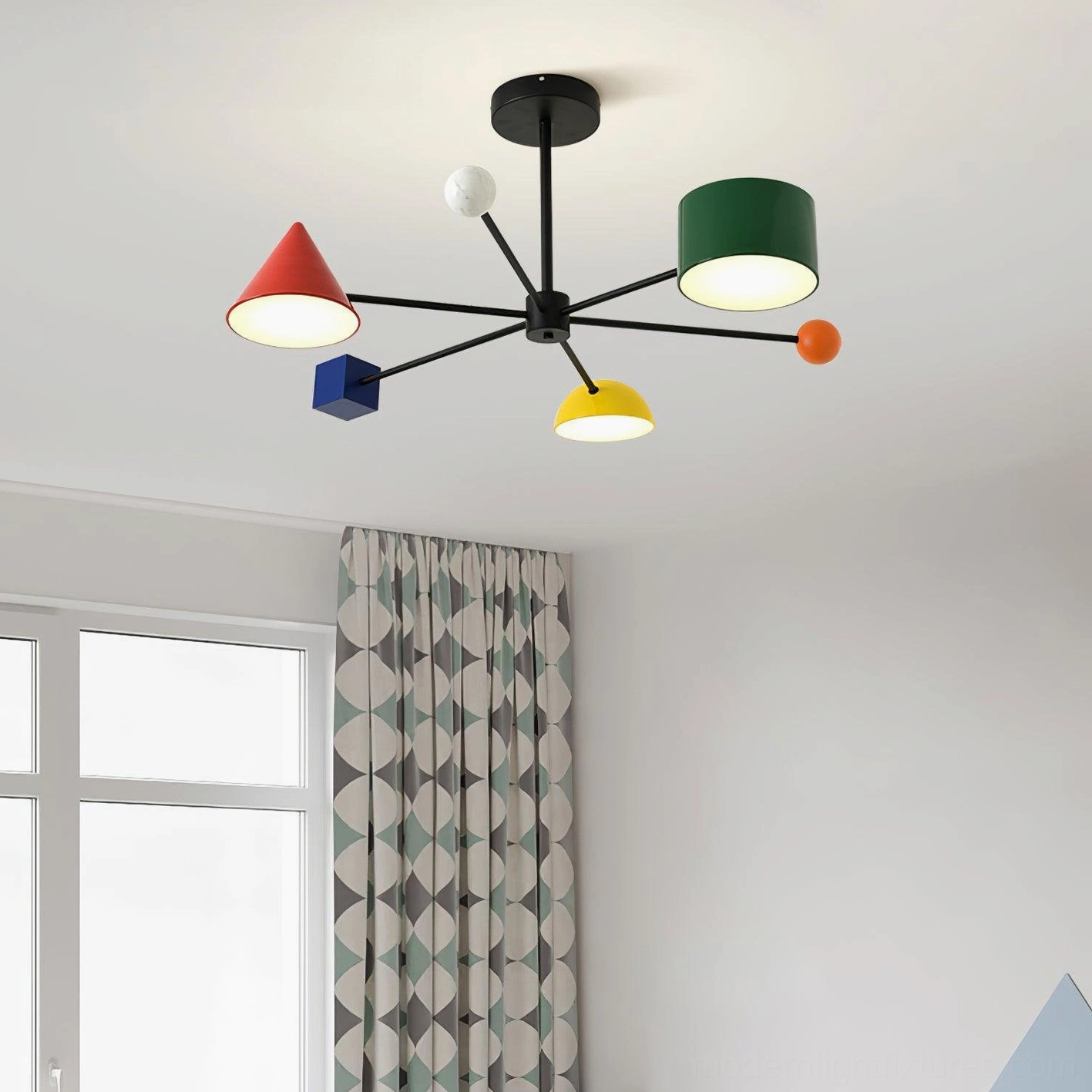 Sputnik style ceiling light with bright colored lamp components in minimalist Nordic kids room