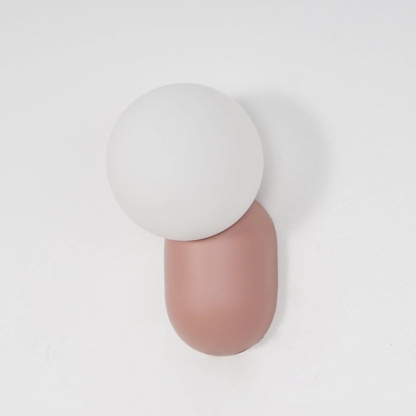 Nordic design wall sconce with geometric silhouette creating functional beauty in modern space