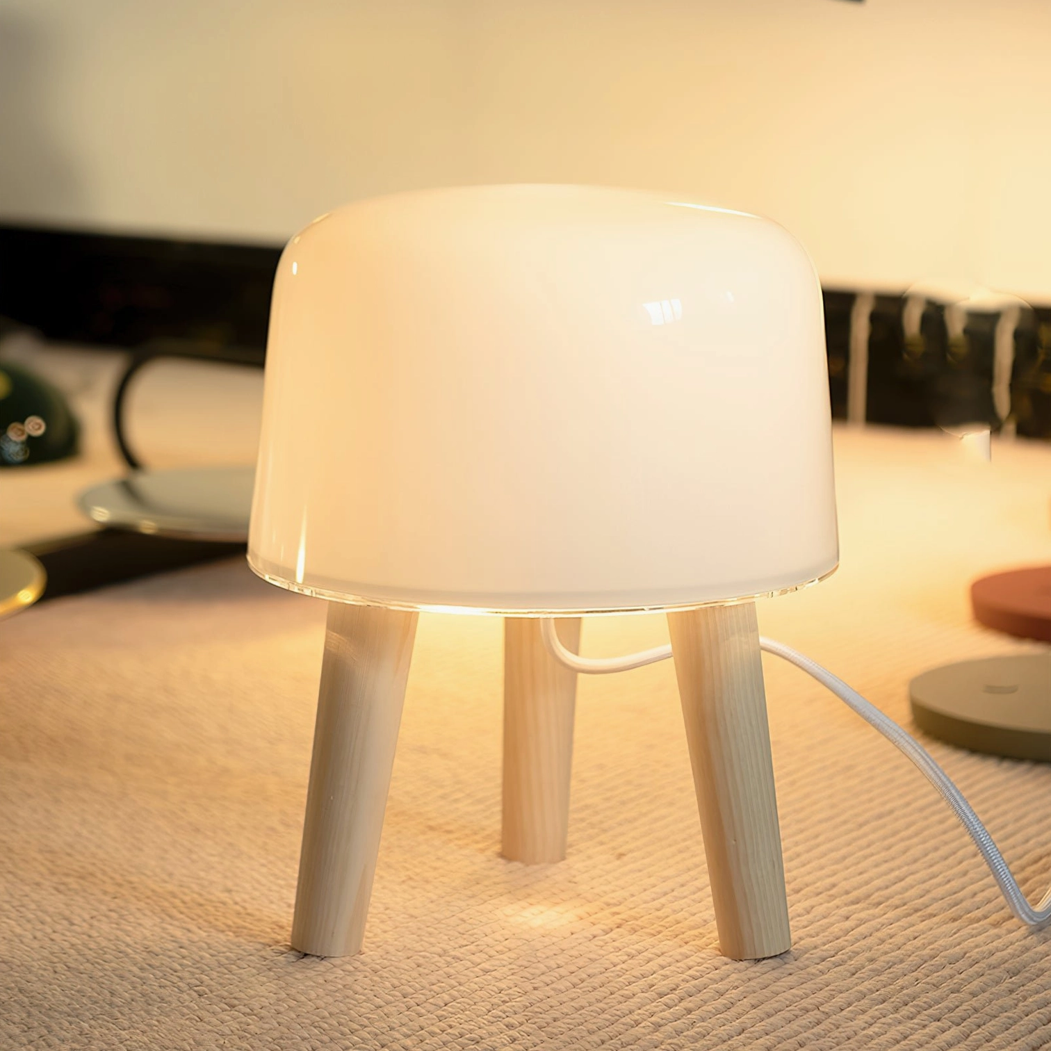 Nordic minimalist table lamp featuring frosted milk glass shade and sustainable wood construction for ambient home lighting