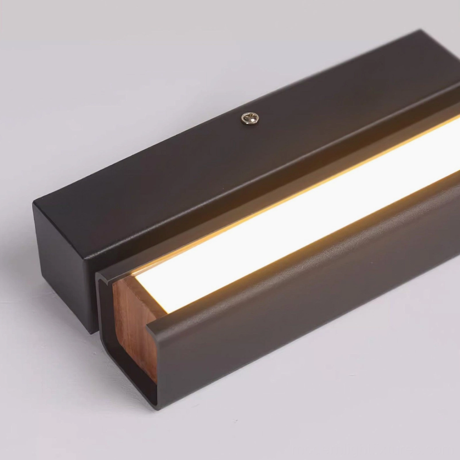 Nordic design rotatable wall sconce showing aluminum construction and wood trim accent details
