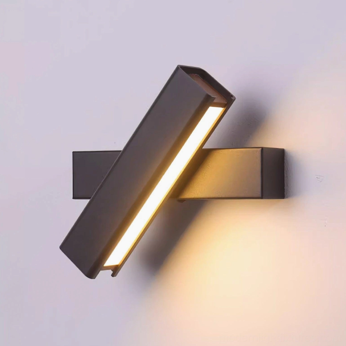 Nordic minimalist wall lamp showcasing rotatable head and warm ambient lighting in bedroom setting