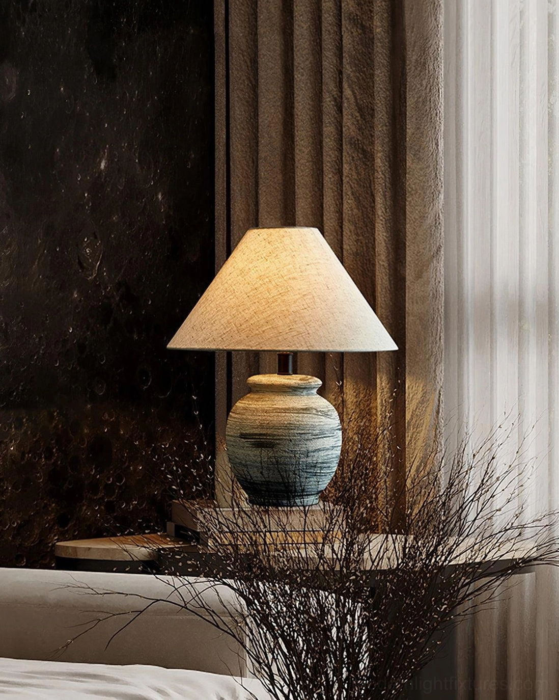 Norma table lamp on bedroom bedside table with dried branch decoration, dark warm interior ambiance