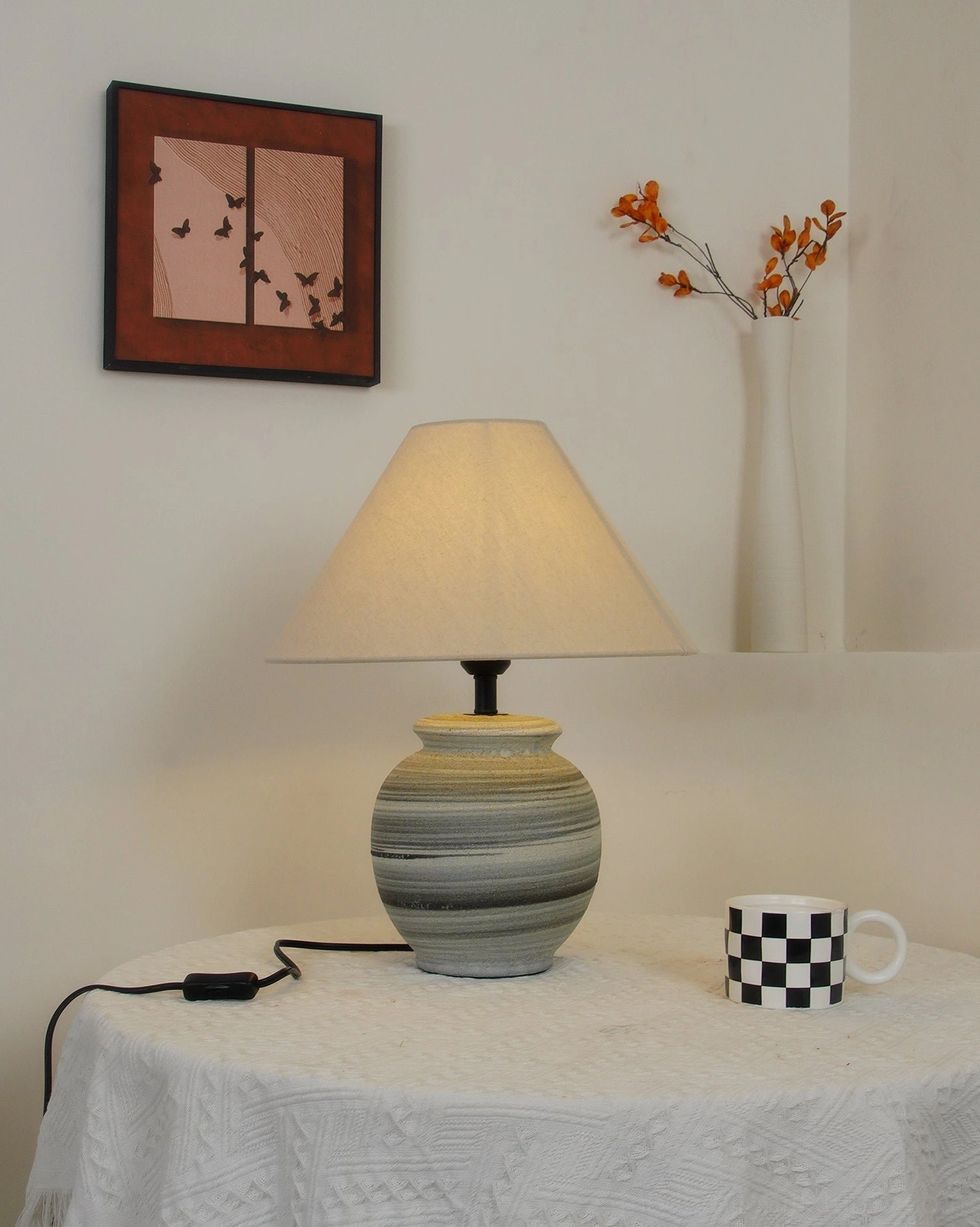 Norma ceramic table lamp as decorative accent in mid-century modern interior with retro furnishings