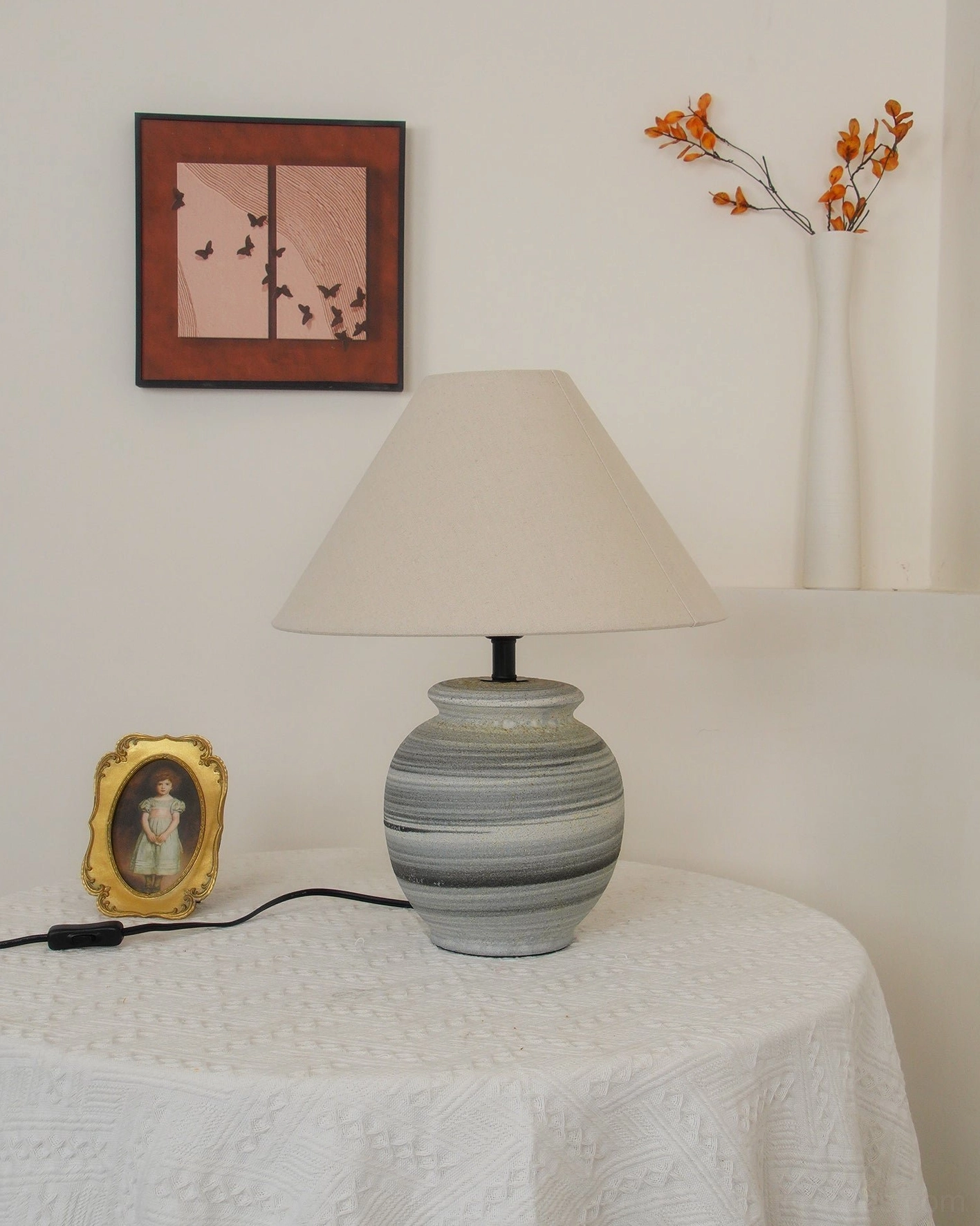 Norma ceramic table lamp in retail boutique display showing product lighting and ambiance creation