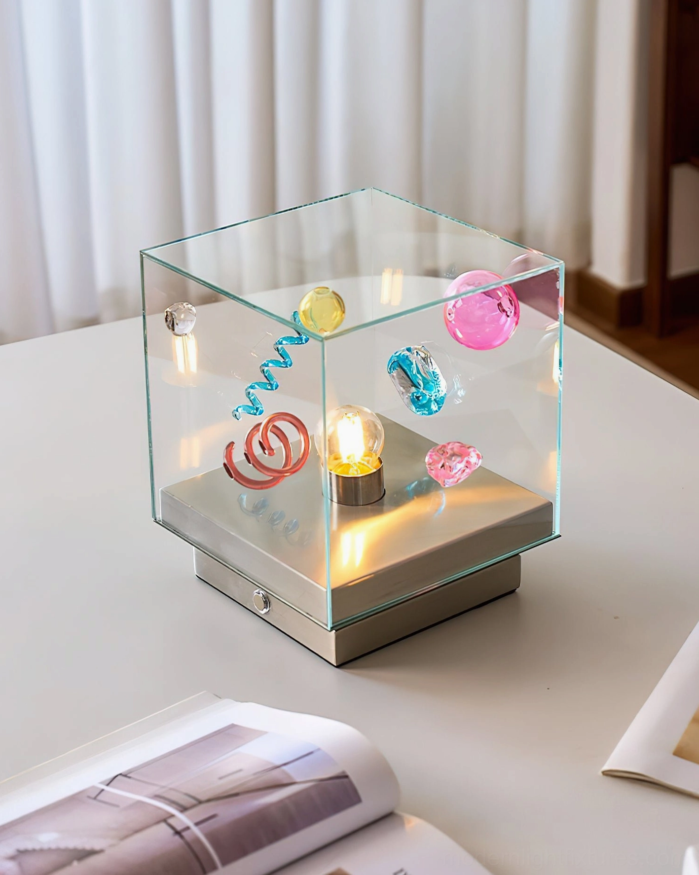 Nova Box Cube Table Lamp on home table with rotatable chrome metal base