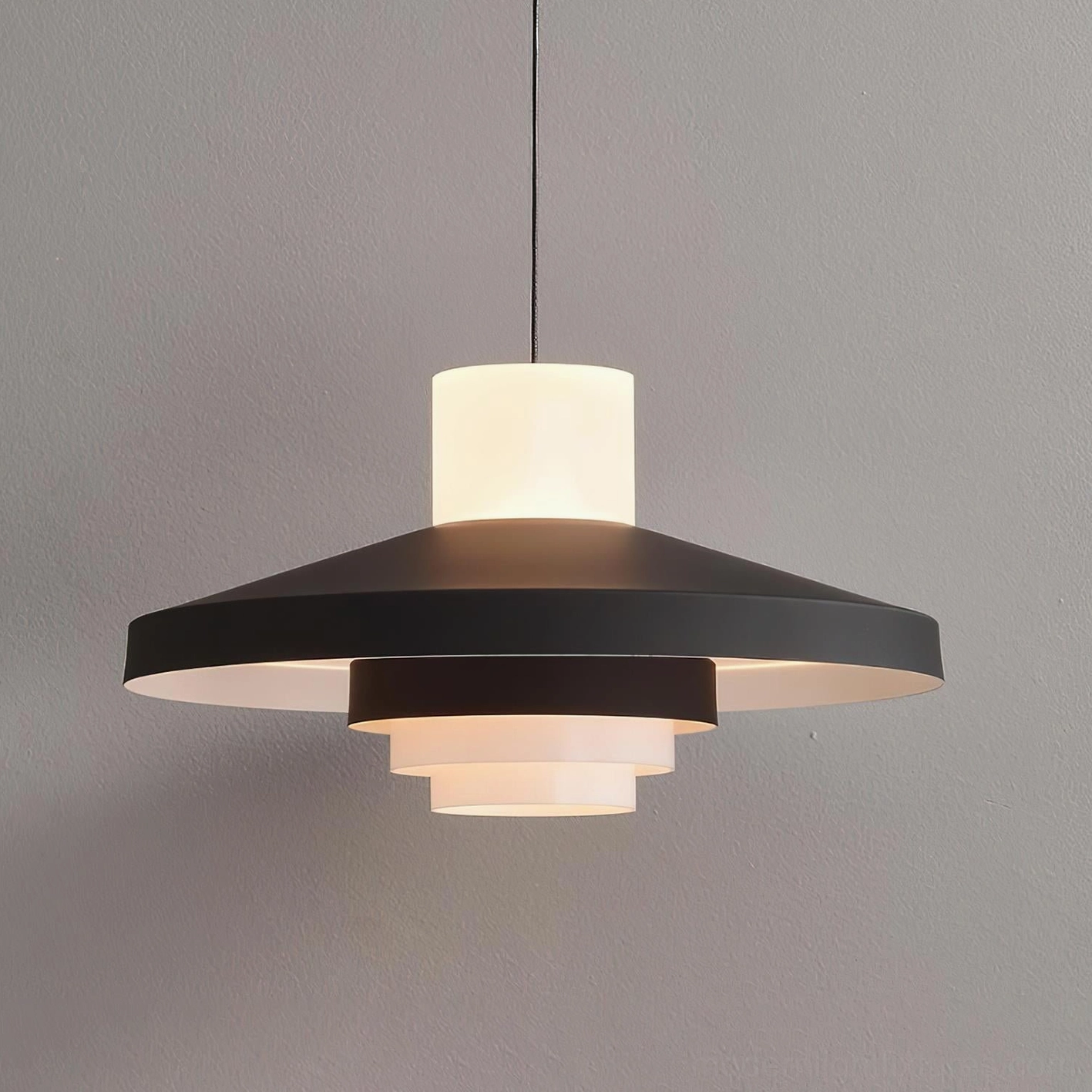 Nova Cap geometric pendant light in black color variant with warm white LED illumination