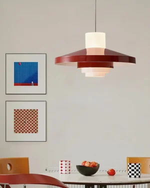 Nova Cap tiered pendant lamp suspended above dining table in warm residential dining room setting