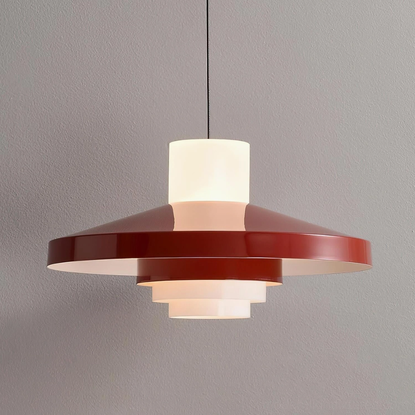 Nova Cap tiered pendant lamp with beige and off-white layered disc shade in contemporary home dining area
