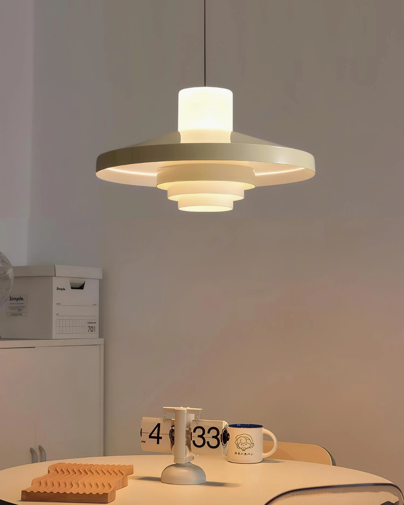 Nova Cap pendant light low angle view of tiered aluminum shade geometric layered construction