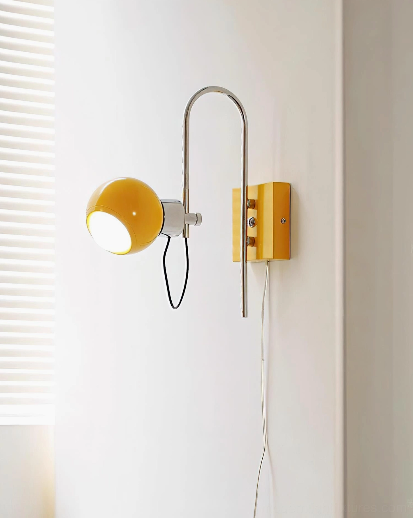 Nova Dot mid-century modern wall sconce in chrome finish with adjustable arching stem and spherical light head
