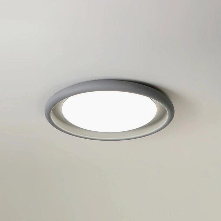 Light gray minimalist ceiling light fixture, low-angle overhead detailed view of concrete and acrylic construction