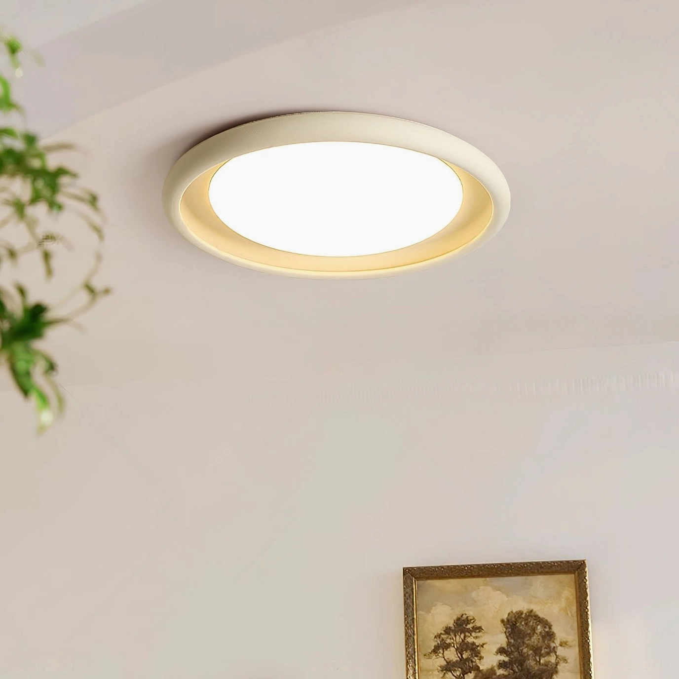 Lit concrete and acrylic ceiling light fixture warm illumination, high-angle overhead shot in modern living room
