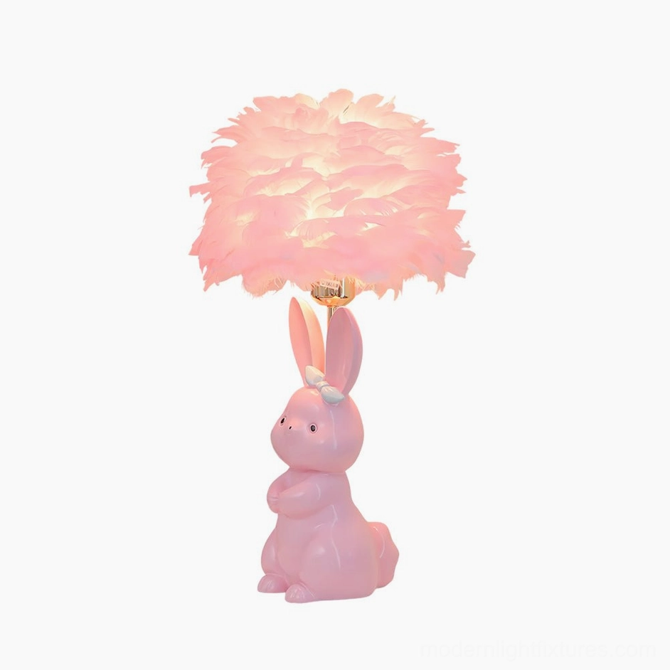 Charming ceramic rabbit lamp with soft feather shade perfect for creating nursery ambiance