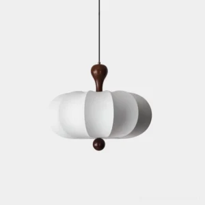 Nutria white fabric pendant light with walnut wood accents - close-up front view