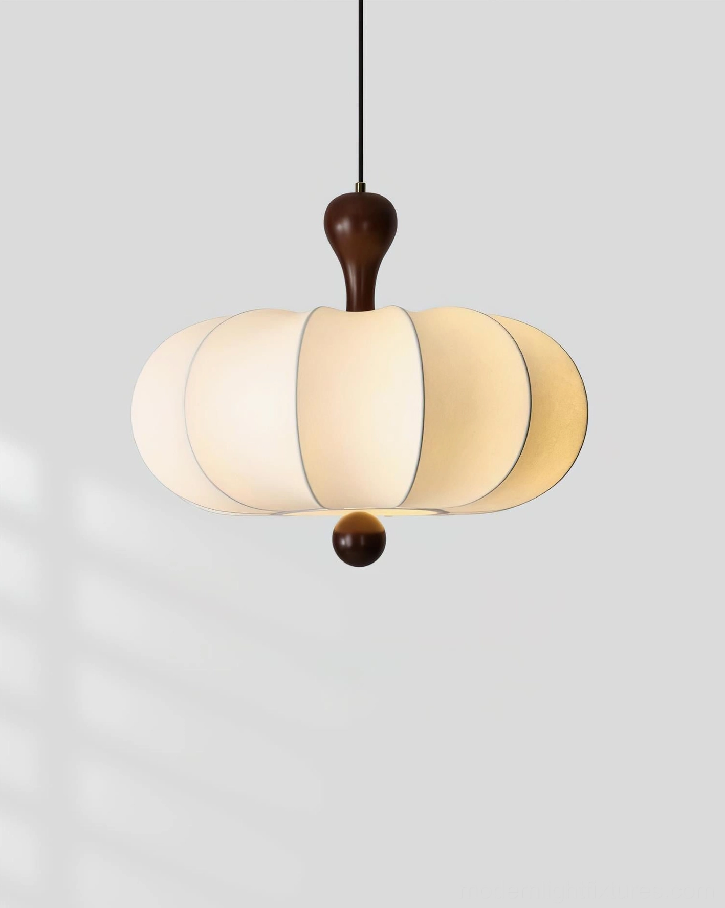 Nutria white fabric pendant fixture in scandinavian minimalist setting