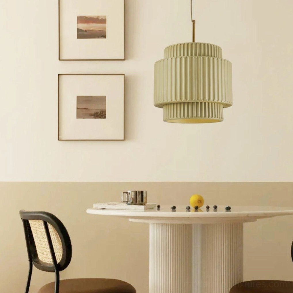 Beige tan Nyla tiered ribbed pendant light, dining area eye-level view, warm neutral toned space
