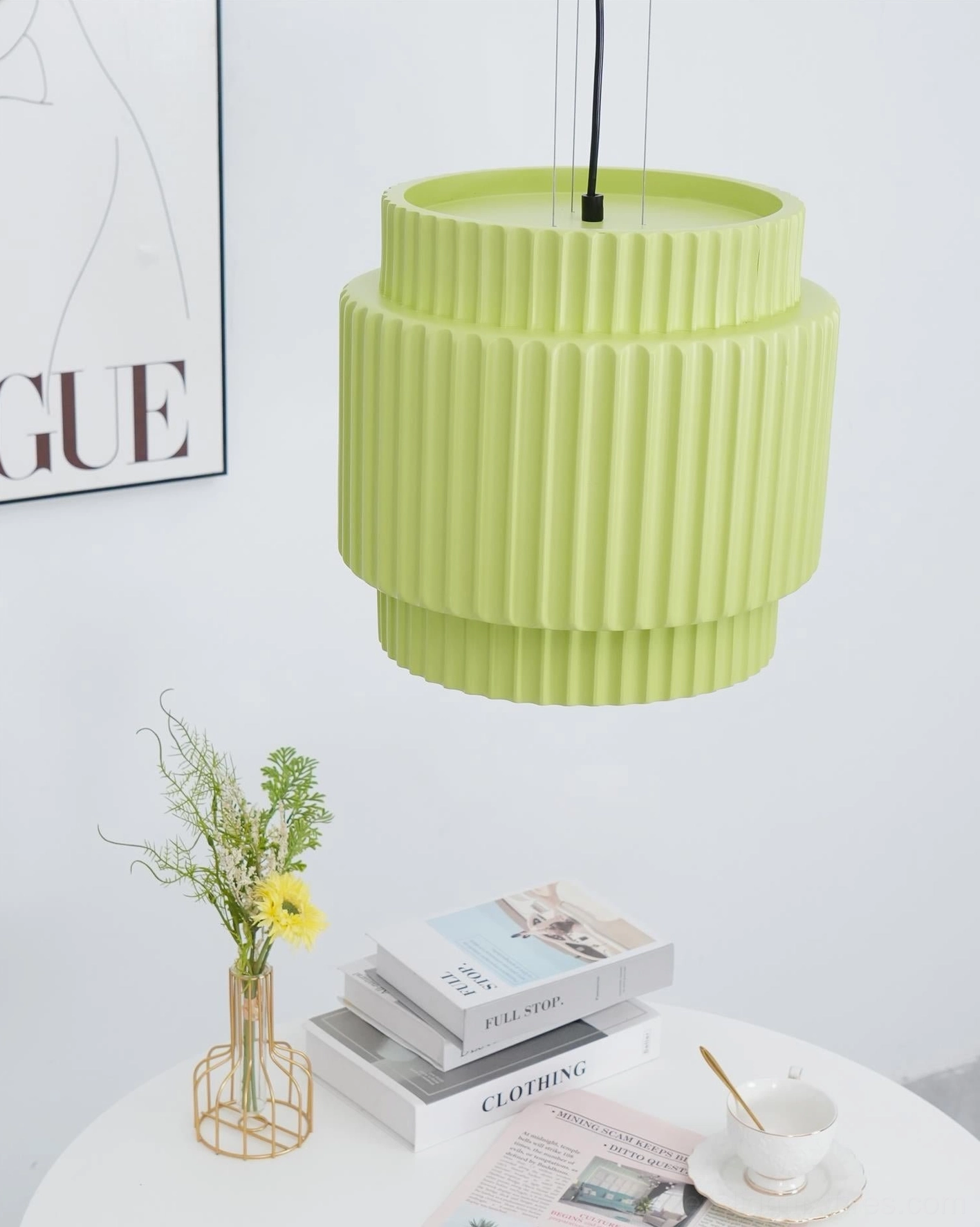 Bright lime green Nyla resin pendant light, bottom-up close-up, matte finish black suspension cord
