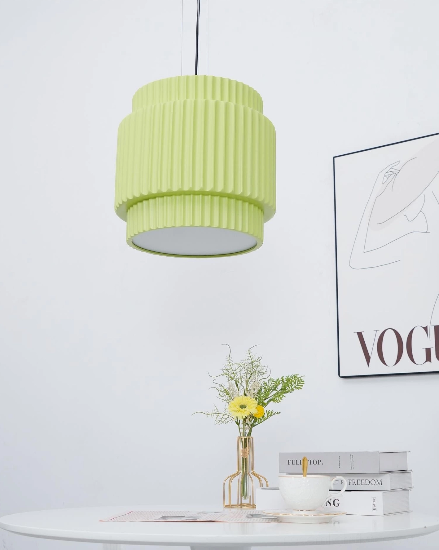 Pastel lime green Nyla pendant light, frontal desk background, ribbed texture minimalist wall art