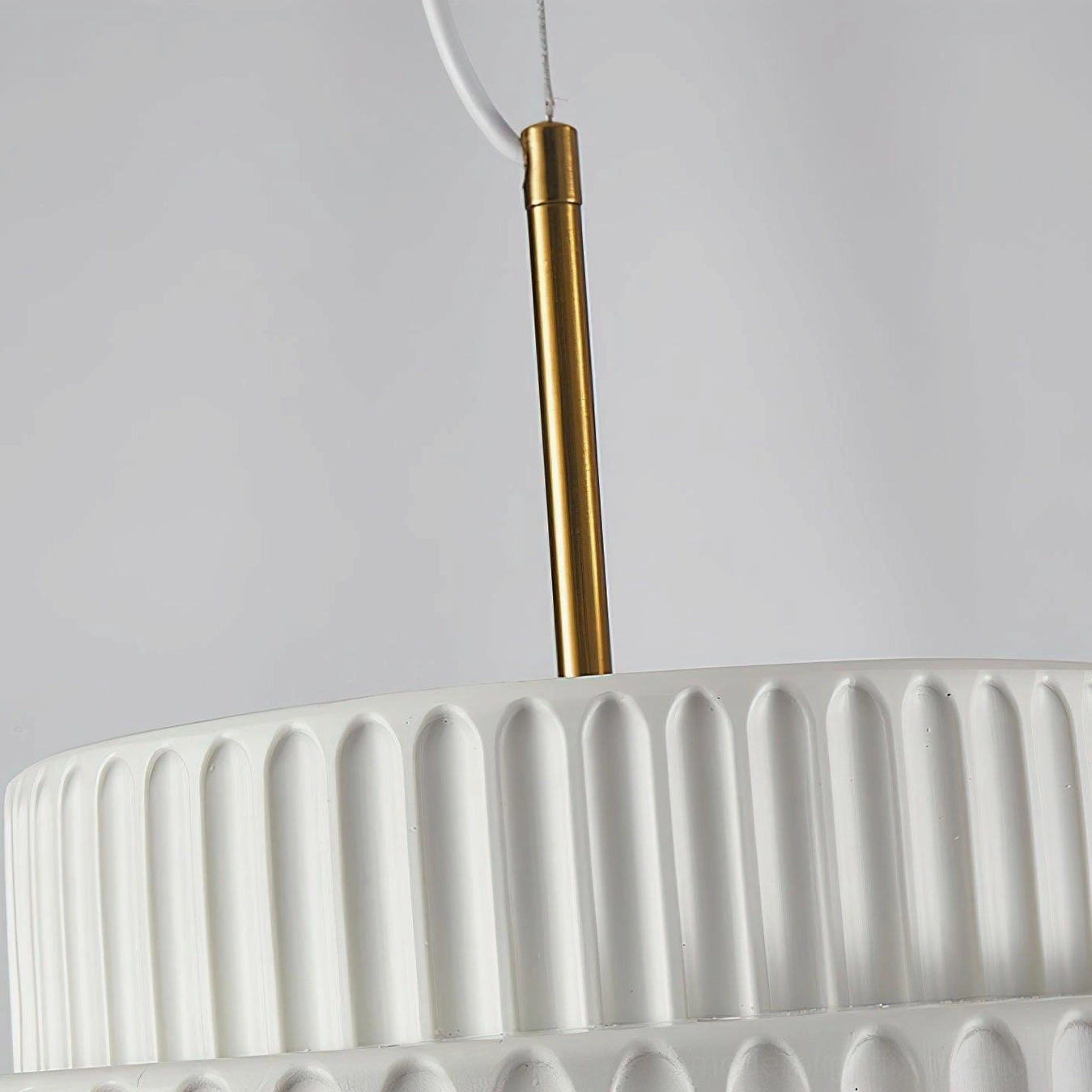 Nyla resin pendant light sculptural form, mid-century modern design philosophy