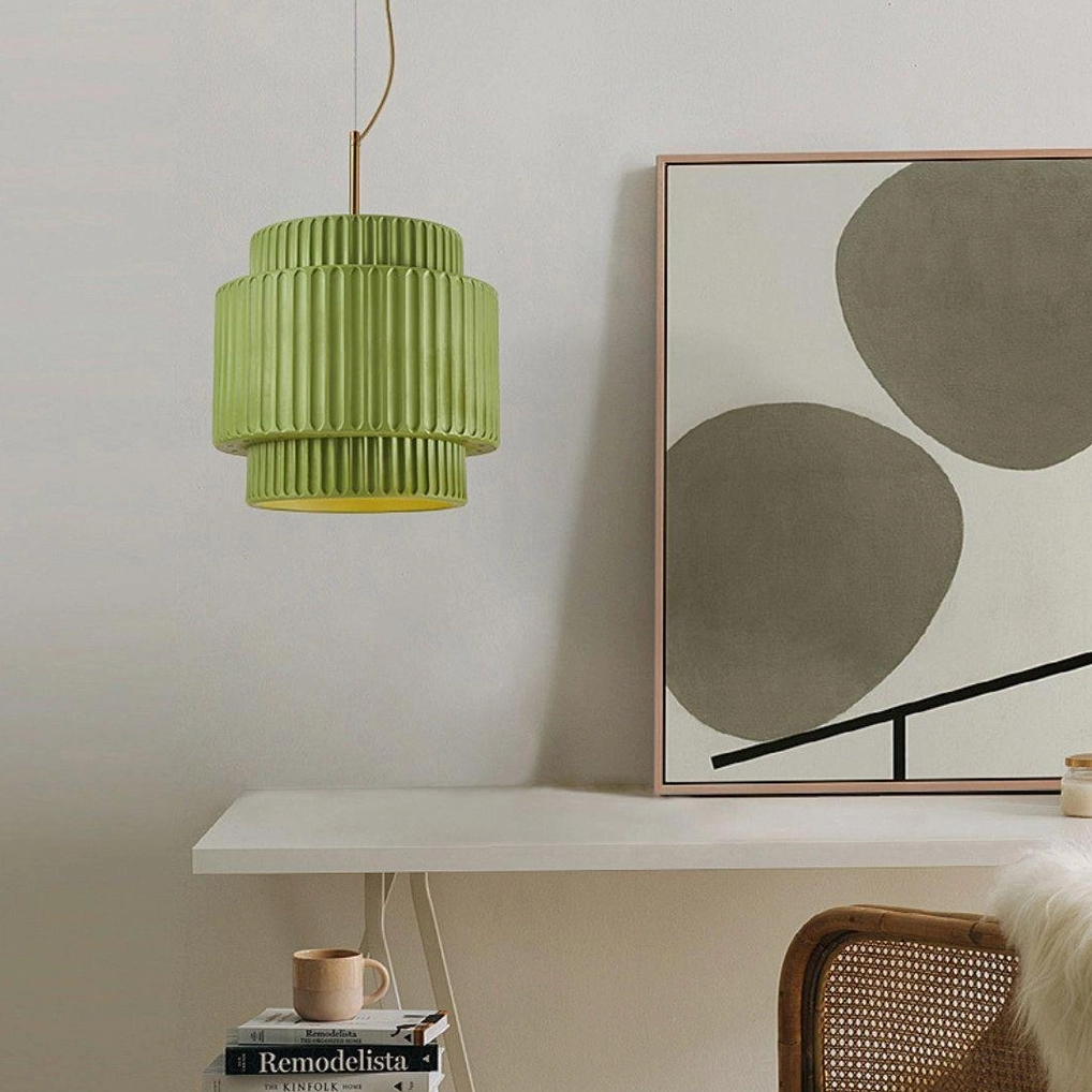Single sage green ribbed resin pendant light, side view home workspace, layered fluted silhouette
