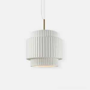 Nyla ribbed resin pendant light with fluted carving detail, white finish, brass hardware, studio frontal view