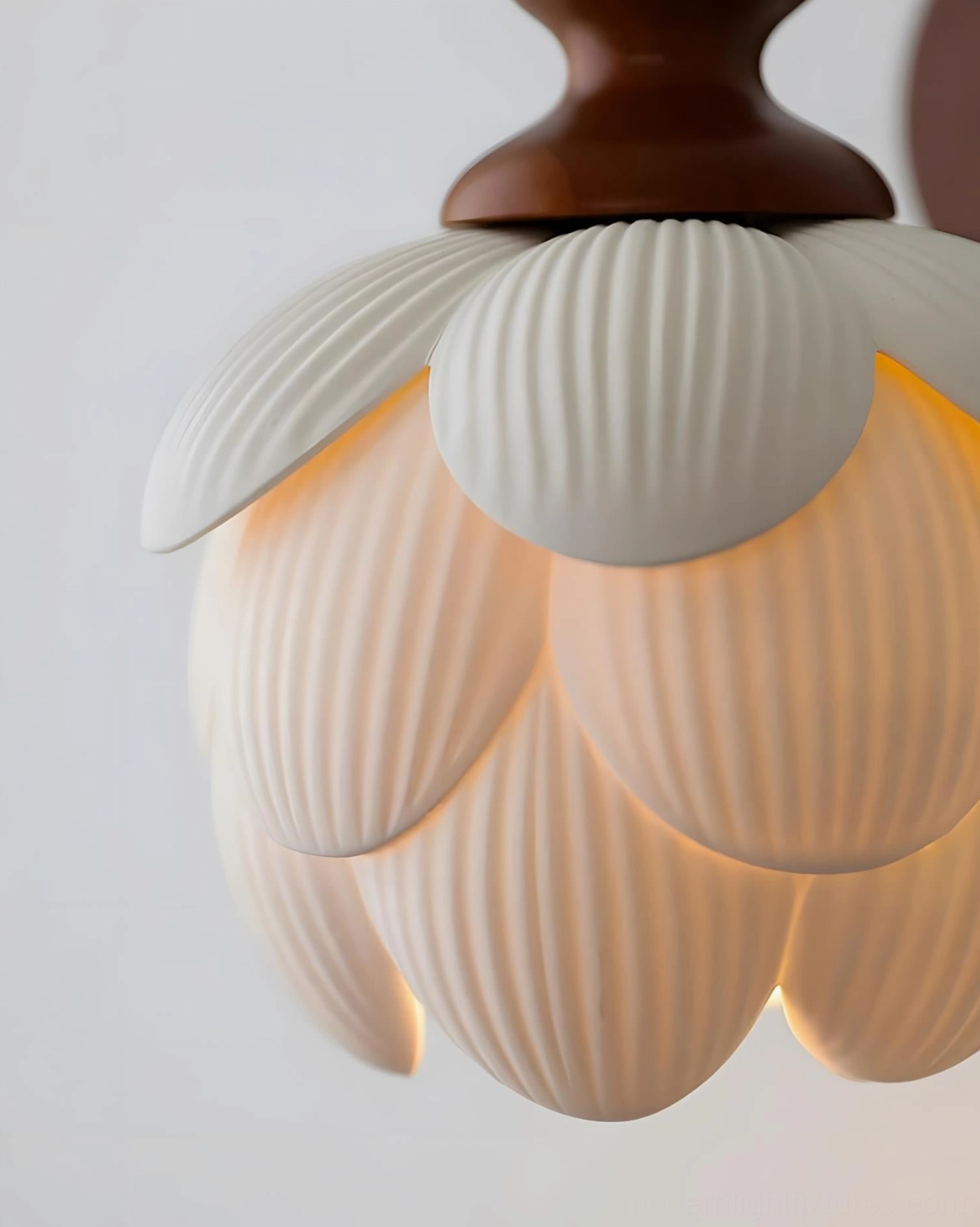 Oak wood backplate and metal arm attachment detail for hardwired ceramic lotus wall sconce installation