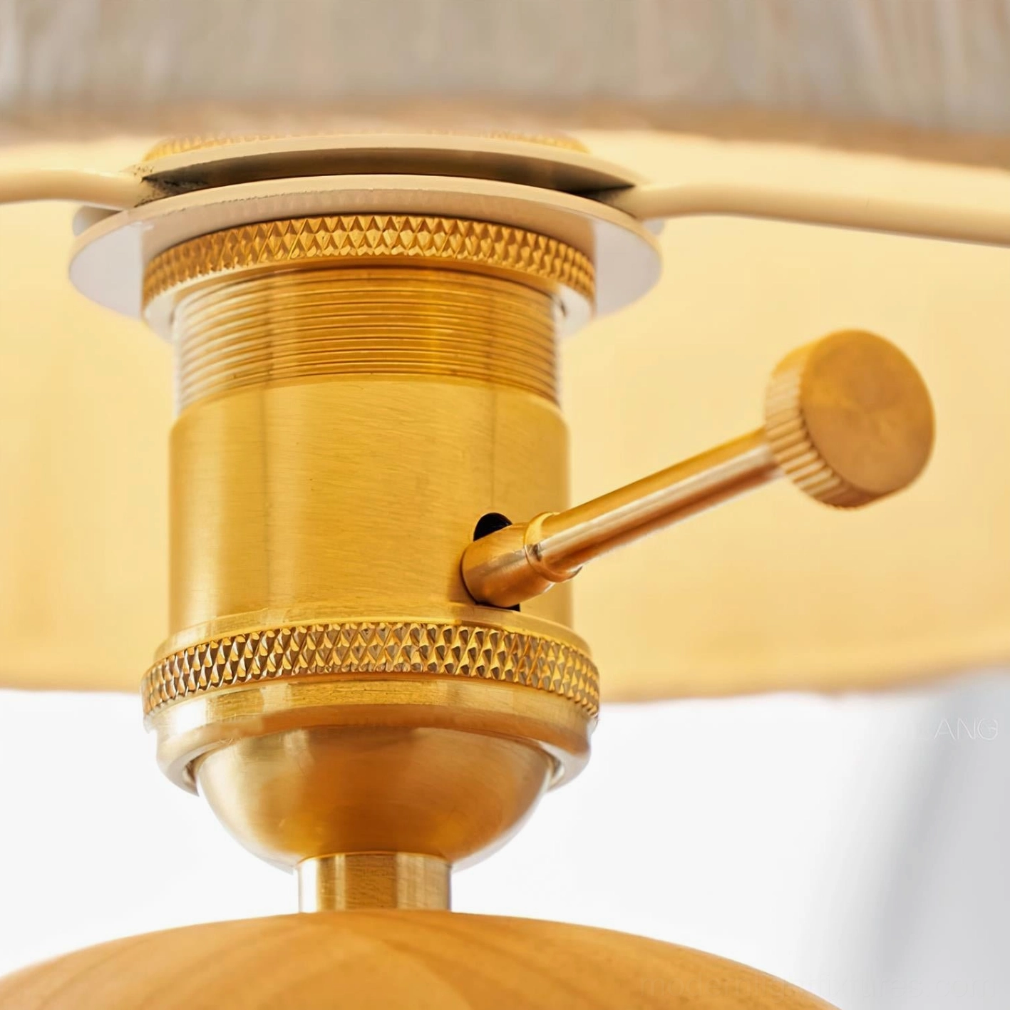 Oak wood table lamp with rice paper shade providing warm ambient lighting for dining and living spaces
