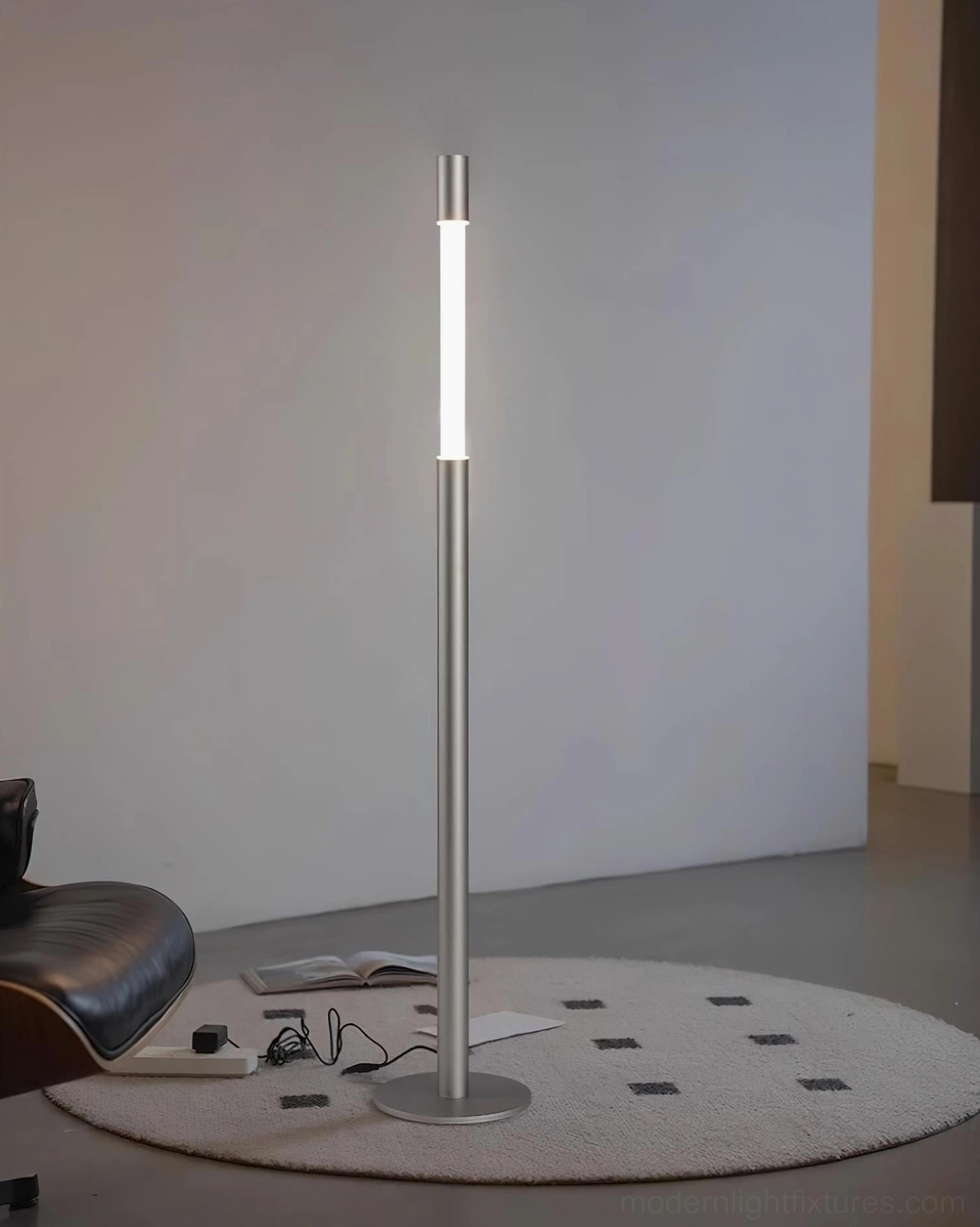 Obelisk LED floor lamp showcasing geometric minimalist form and clean cylindrical design