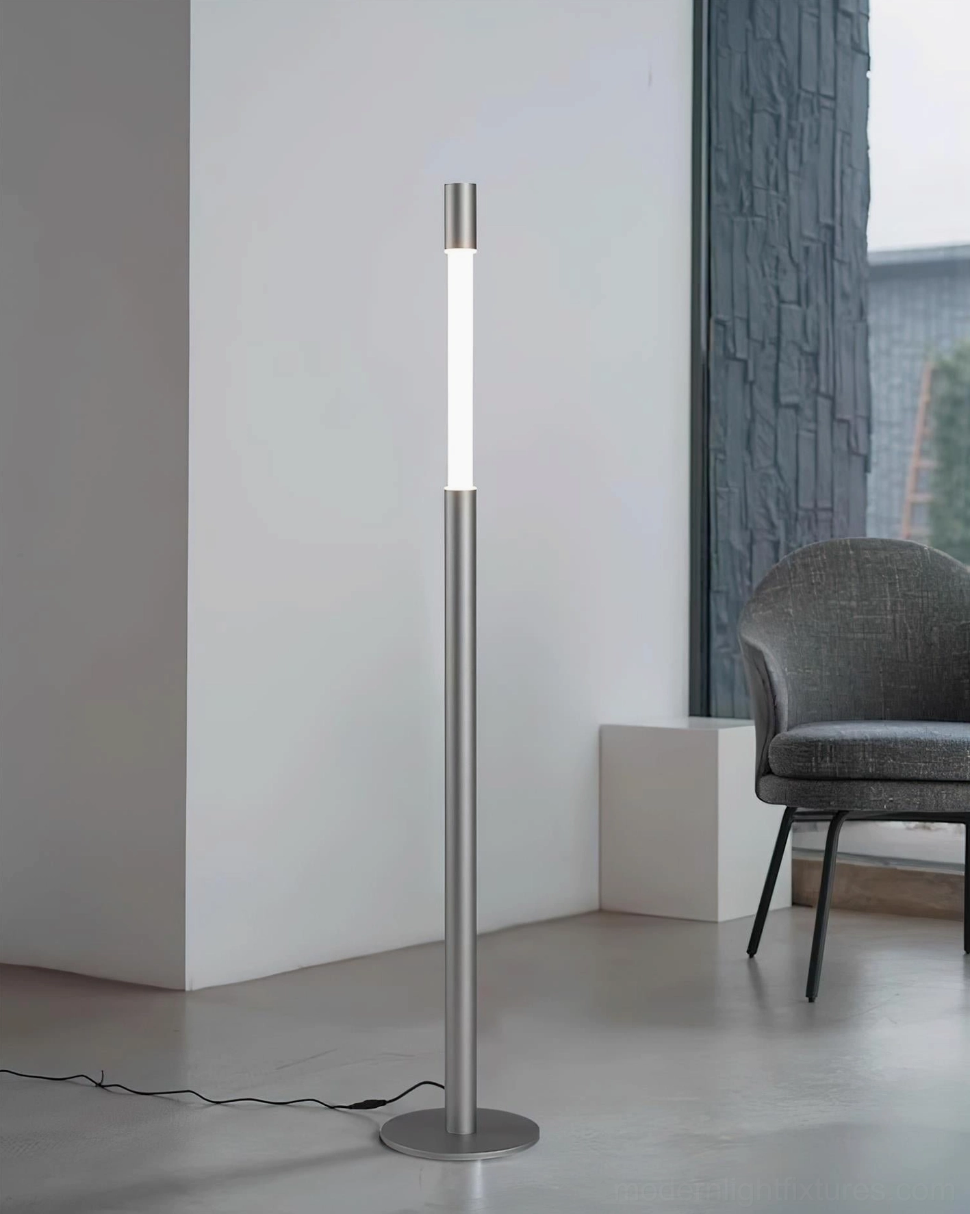 Modern Obelisk floor lamp profile view highlighting slender vertical silhouette and aluminum construction
